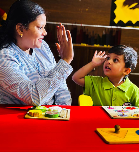 Teacher teaching ABC